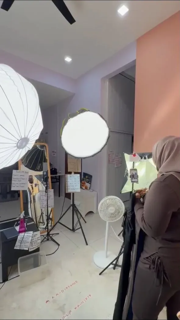 Techwide studio with softbox lights and a host on set